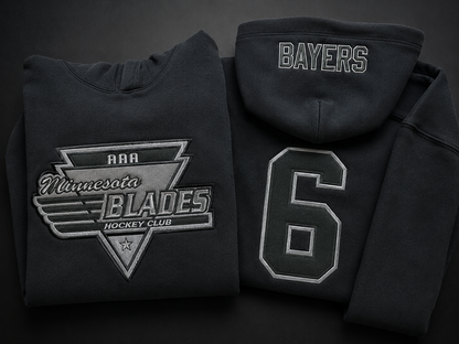 Finished black custom team hoodies with tonal twill applique