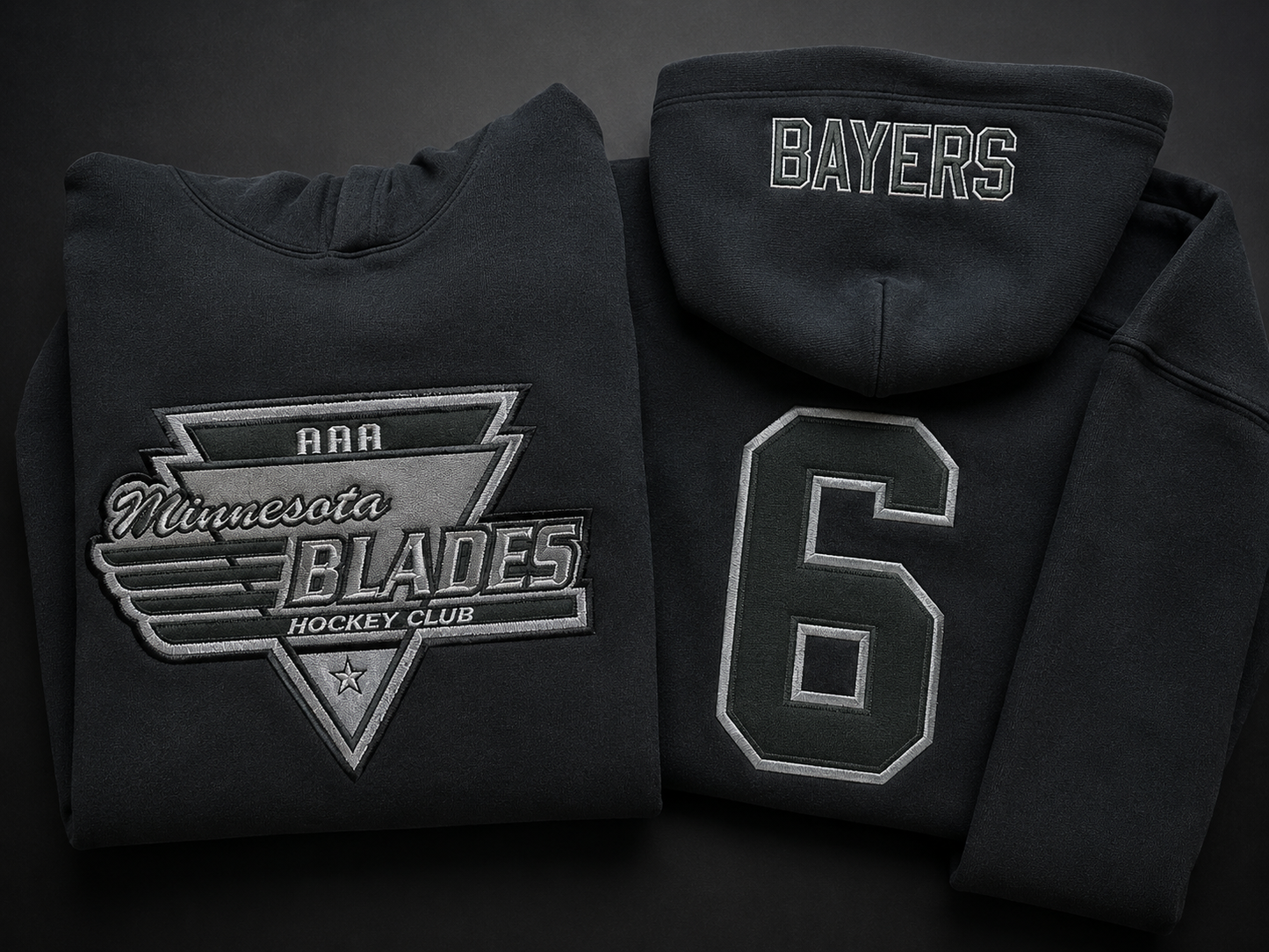 Finished custom team hoodies with names numbers and twill applique