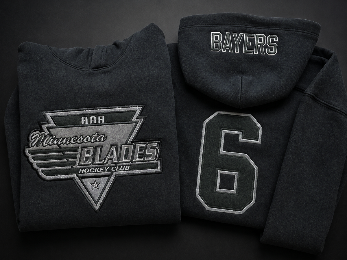 Custom embroidered hoodie with names, numbers, and twill applique detail